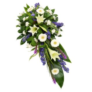 White and purple funeral spray